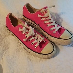 Bright pink Converse